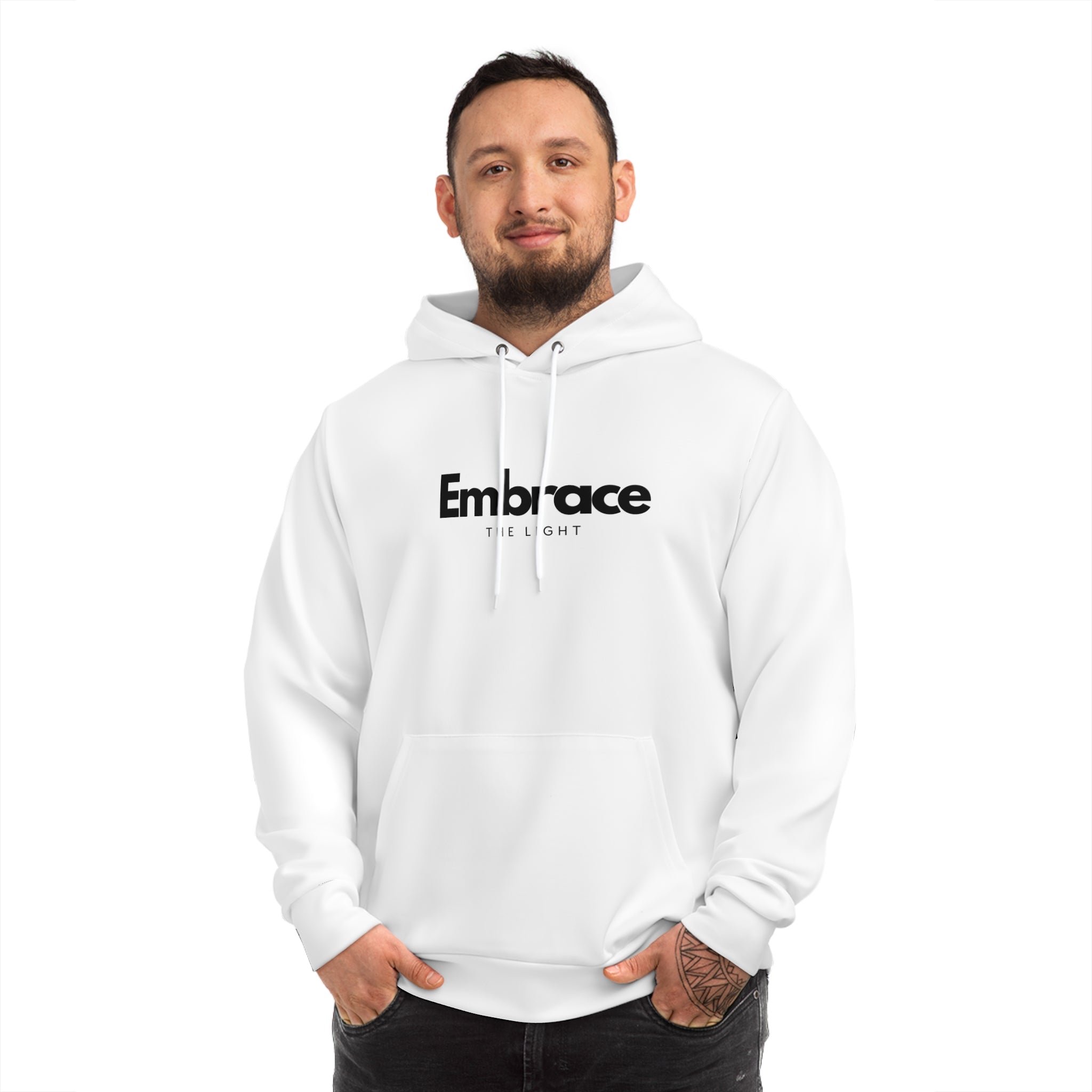 White all-over-print fashion hoodie with 'Embrace The Light' text design. Unisex hoodie made from a polyester-cotton blend for comfort and style.