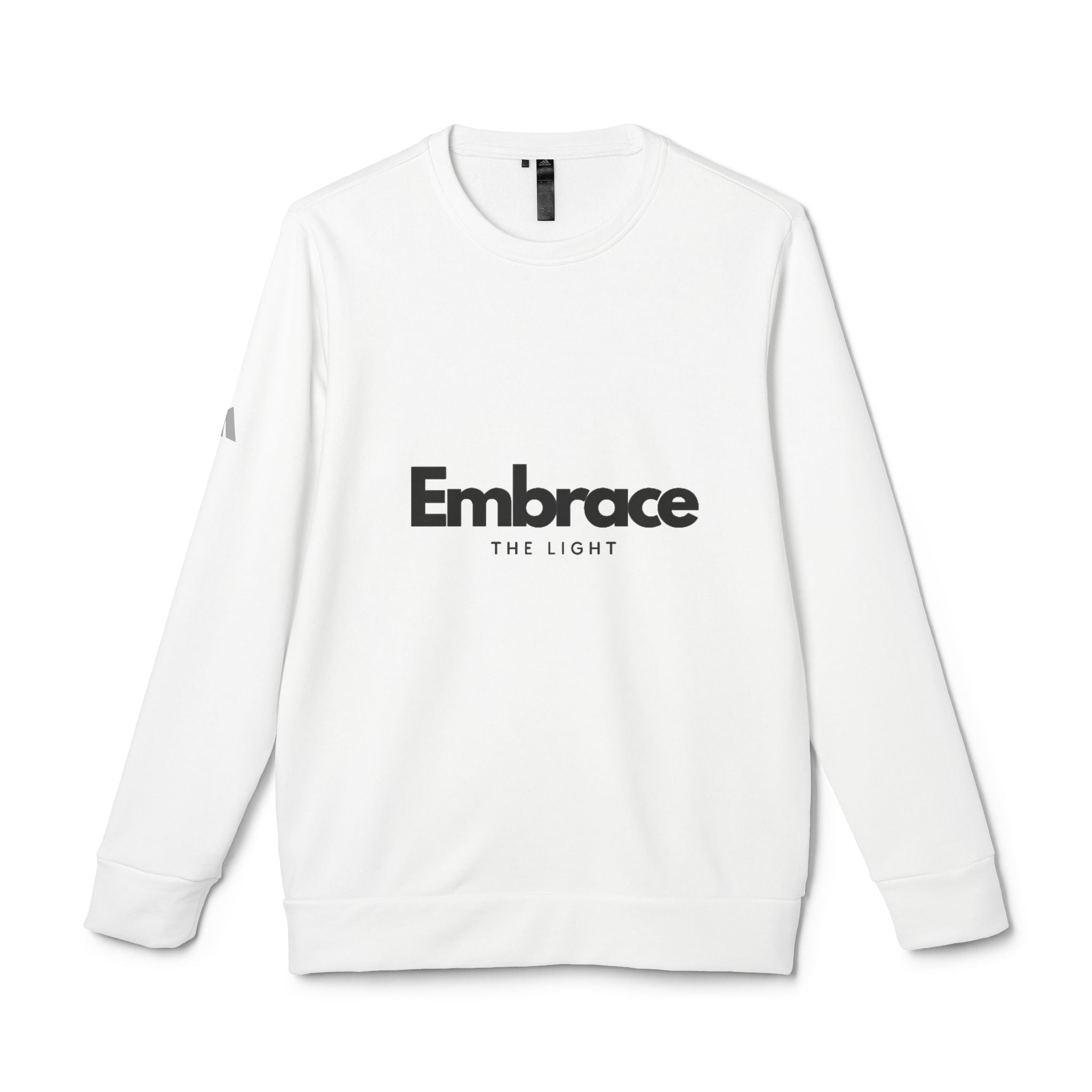 Adidas fleece crewneck sweatshirt in white with 'Embrace The Light' text on the front. Made from eco-friendly BCI cotton and recycled polyester for warmth and sustainability.