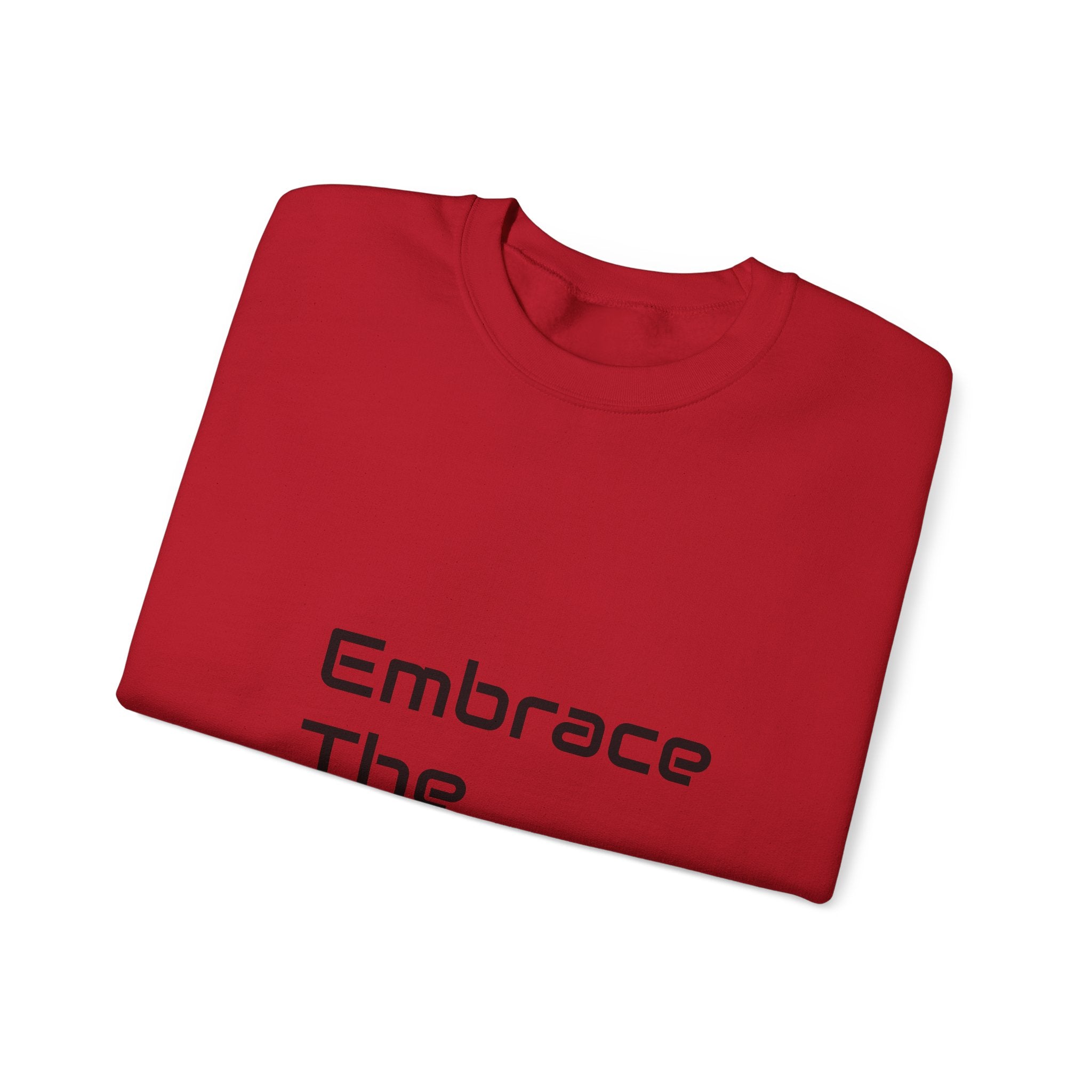 Unisex crewneck sweatshirt in red, made from a cozy 50/50 cotton blend. Features a stylish 'Embrace The' text design, perfect for casual wear.