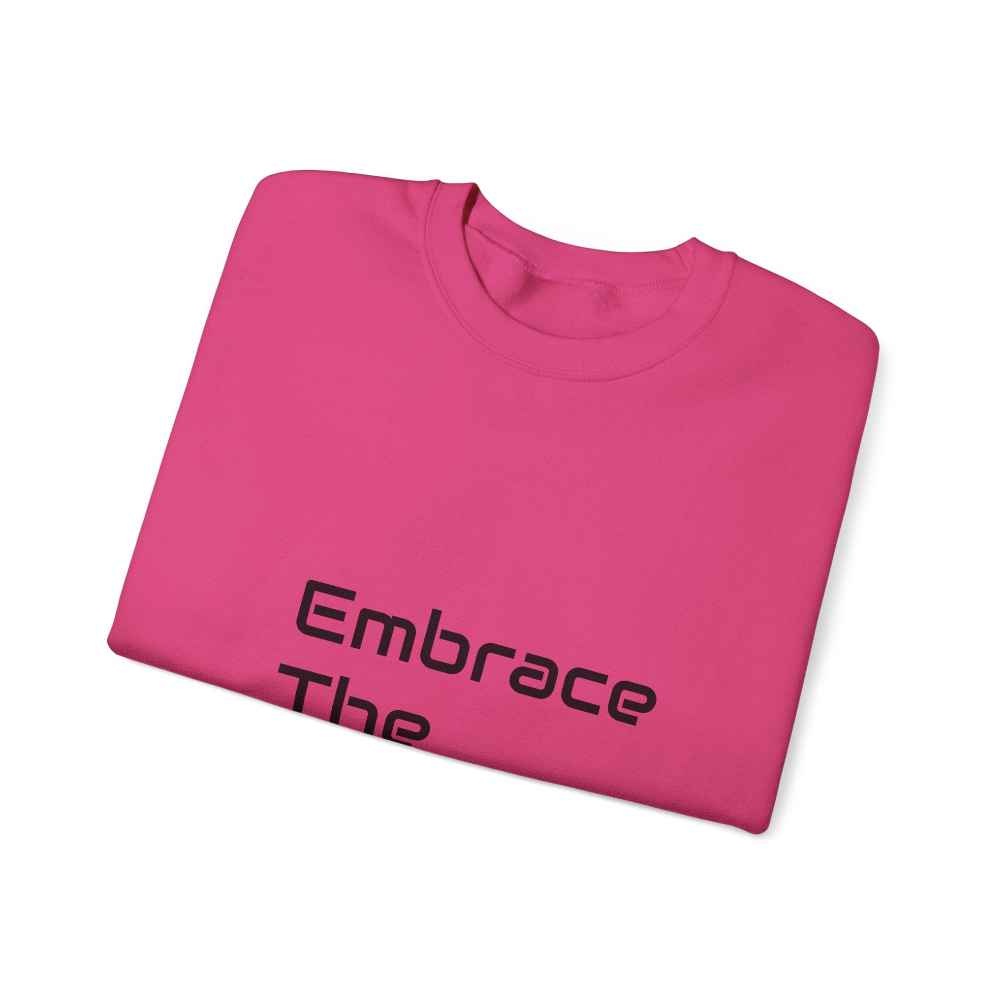 Unisex crewneck sweatshirt in vibrant pink, made from a cozy 50/50 cotton-polyester blend. Features a stylish 'Embrace The' text design on the front.