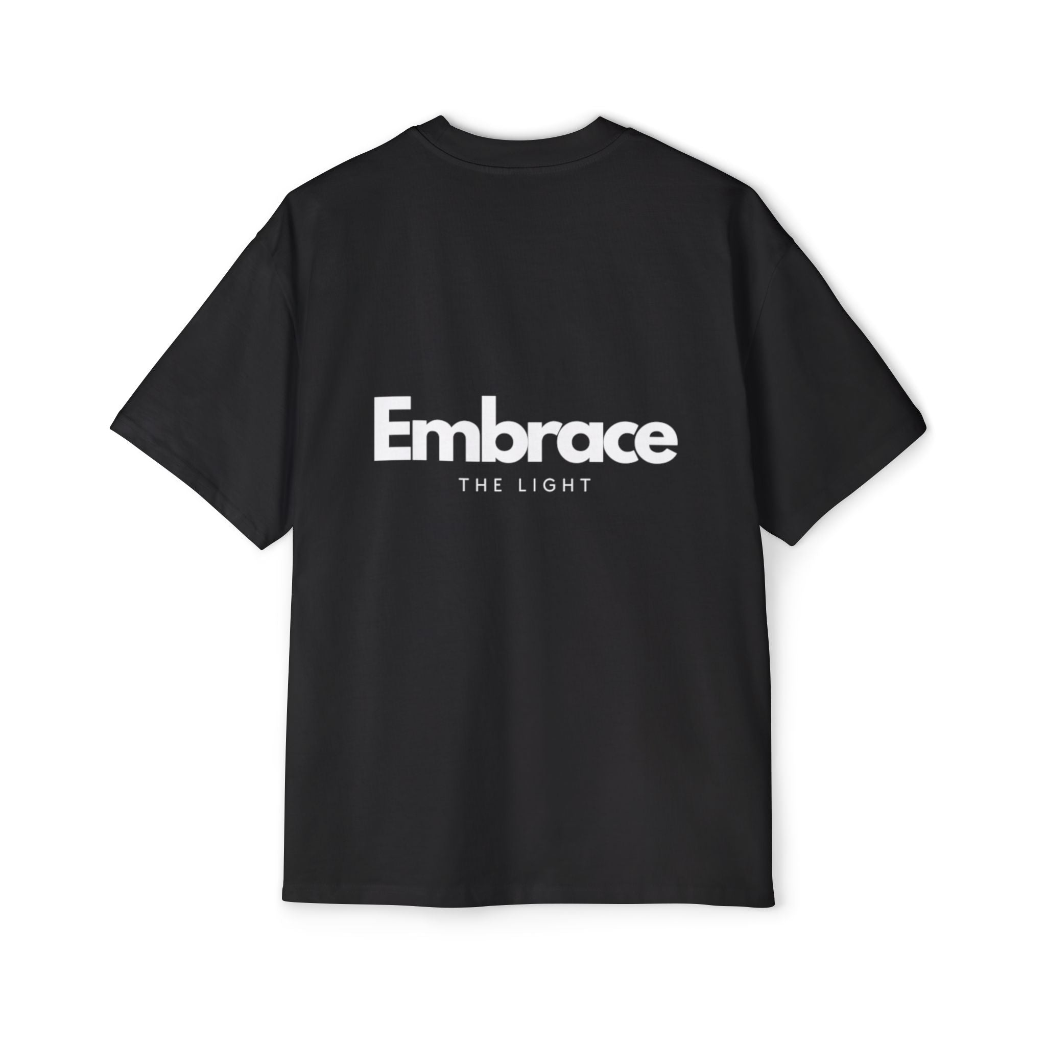 Men's Heavy Oversized Tee in black with 'Embrace The Light' text on the back. Made from 100% cotton for a premium oversized fit, perfect for casual wear.